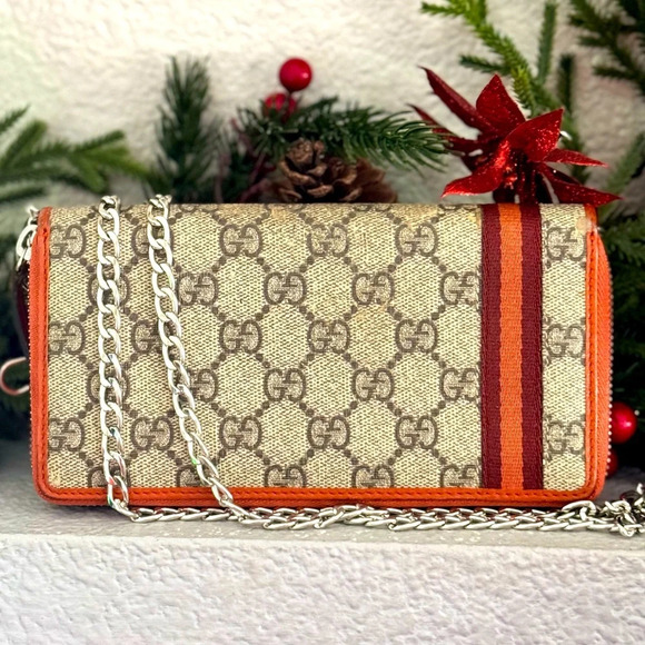 Gucci Handbags - GUCCI

Beige/Orange GG Supreme Canvas and Leather Zip Around Wallet